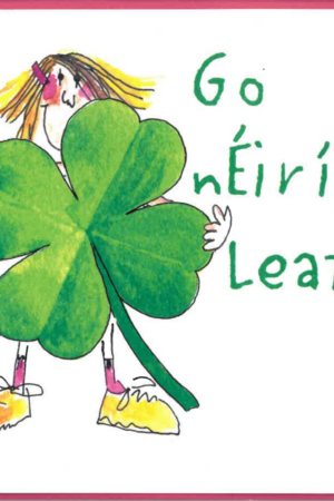 Go nÉirí Leat! Person standing behind giant four-leaf clover